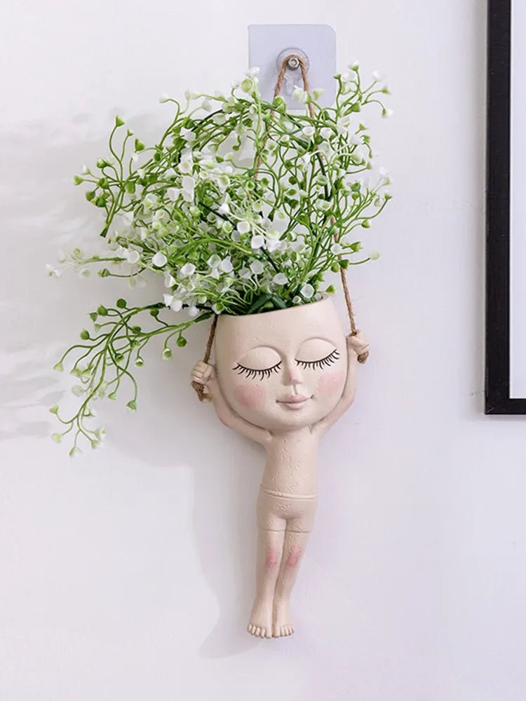 Jarrón creativo decorativo de muñeca gimnasta.